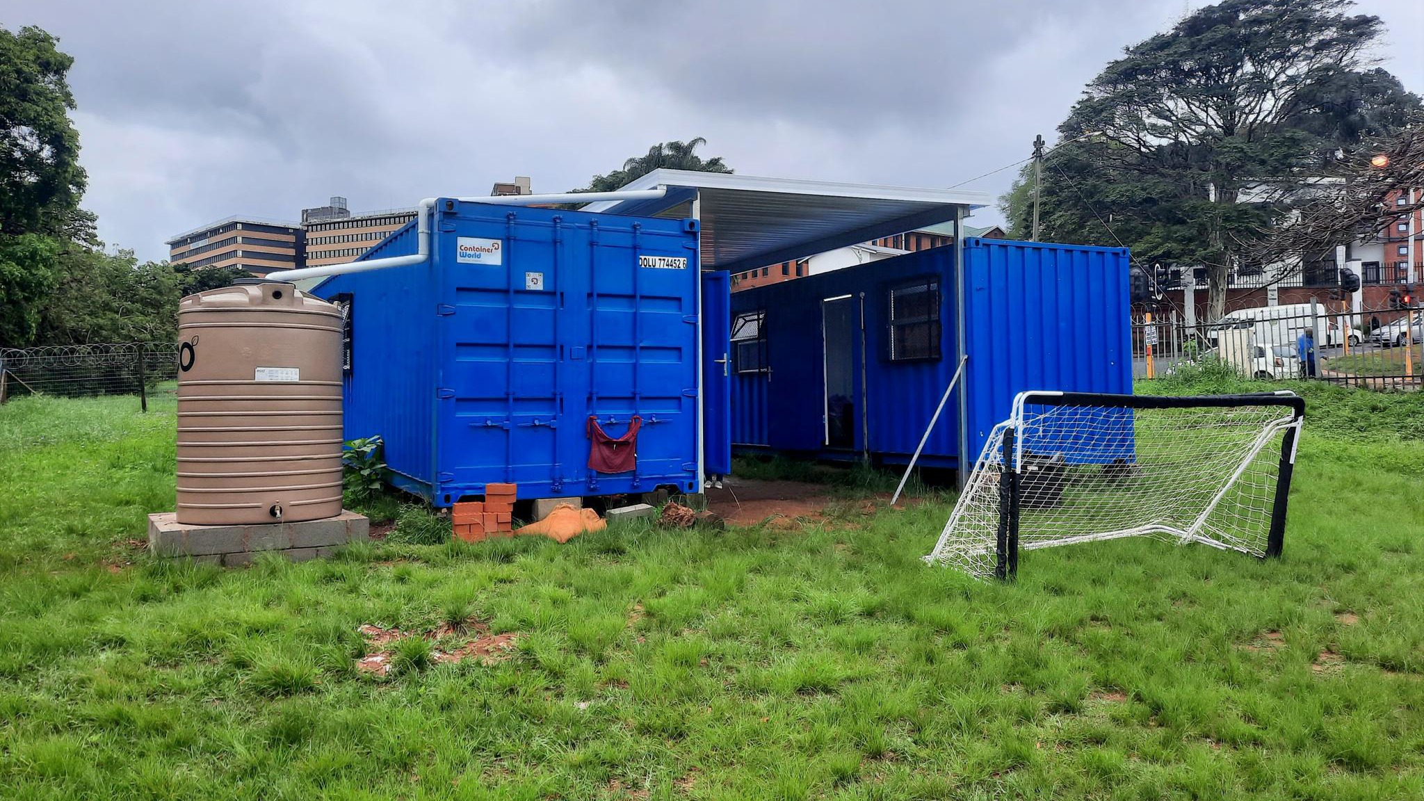 House of Dorcas facility — blue container classrooms