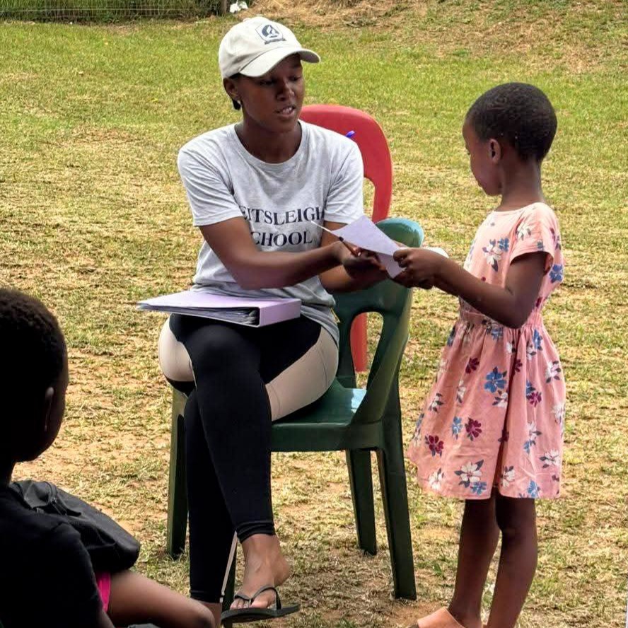 Tutor working with a learner